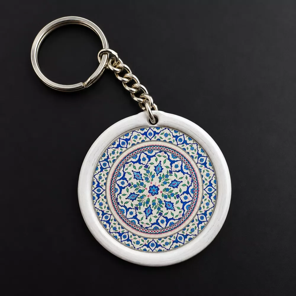Round blue floral mandala wooden keychain.