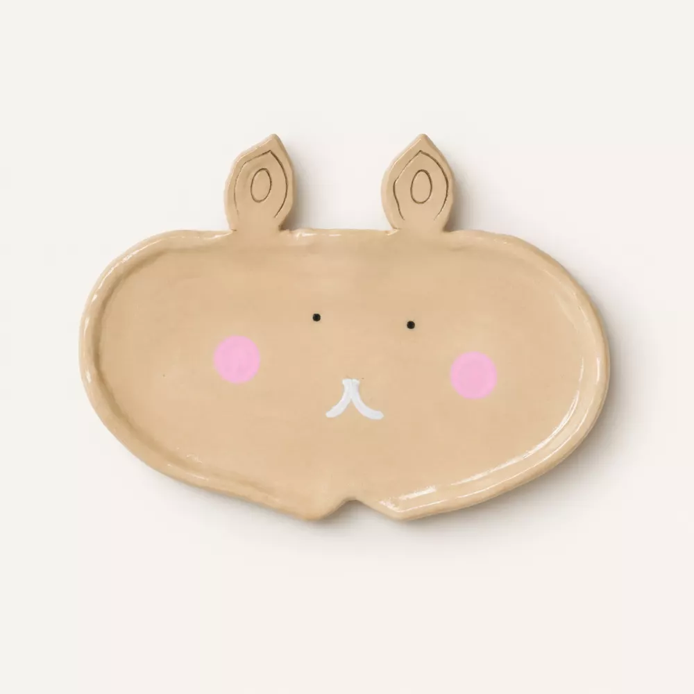 Bunny face handmade trinket tray in soft beige.