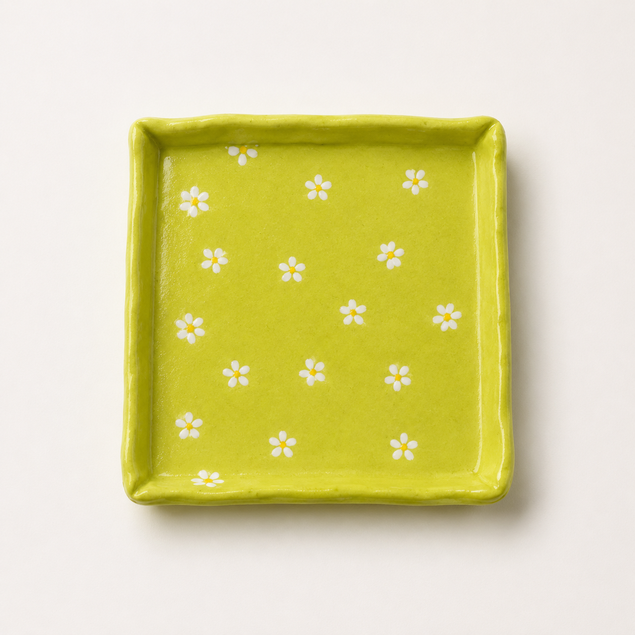 Lime green handmade tray with daisy details.